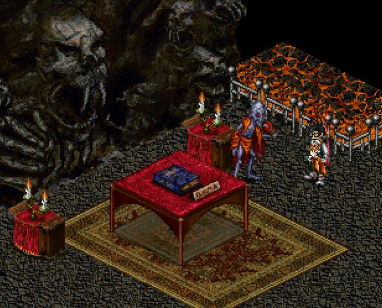 In-game screenshot of a robed figure and a chef-costumed Aisling standing beside a red-draped table set with books and candles.